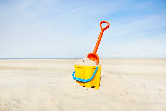 Sand pail and shovel on beach